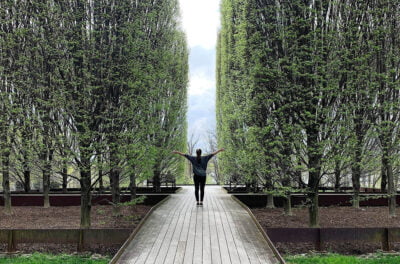woman at the Dia:Beacon museum in the garden - Behind the Scenes NYC