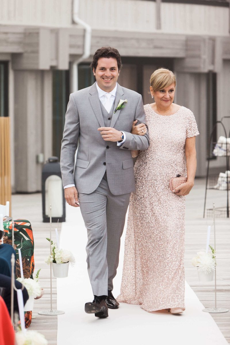 Shop NYC Wedding Kamila Almeida Gurneys Montauk Groom Mom Walking In